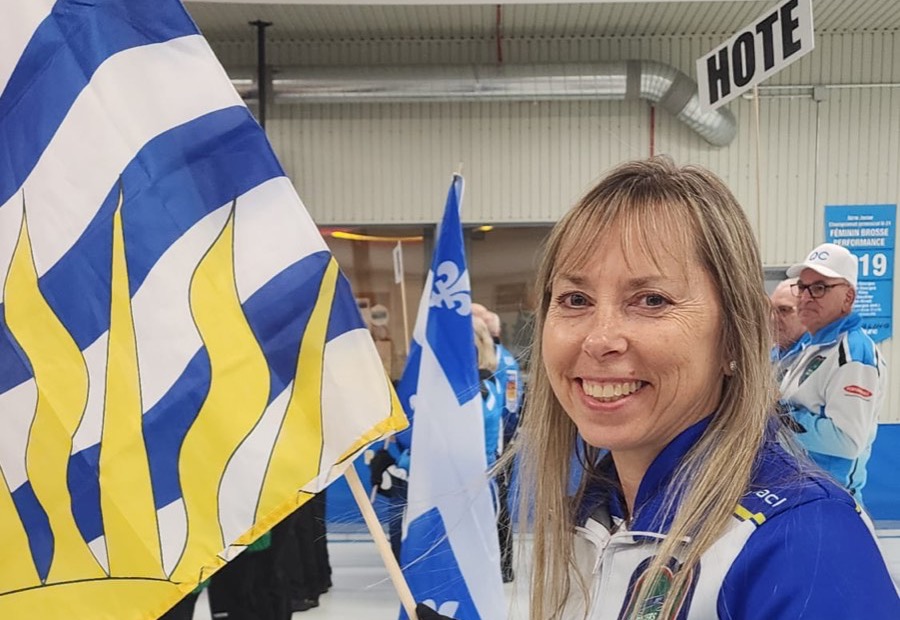Cowan carrying the flag during the opening ceremony
